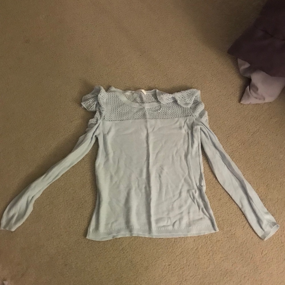 Cold shoulder, ruffled blue sweater